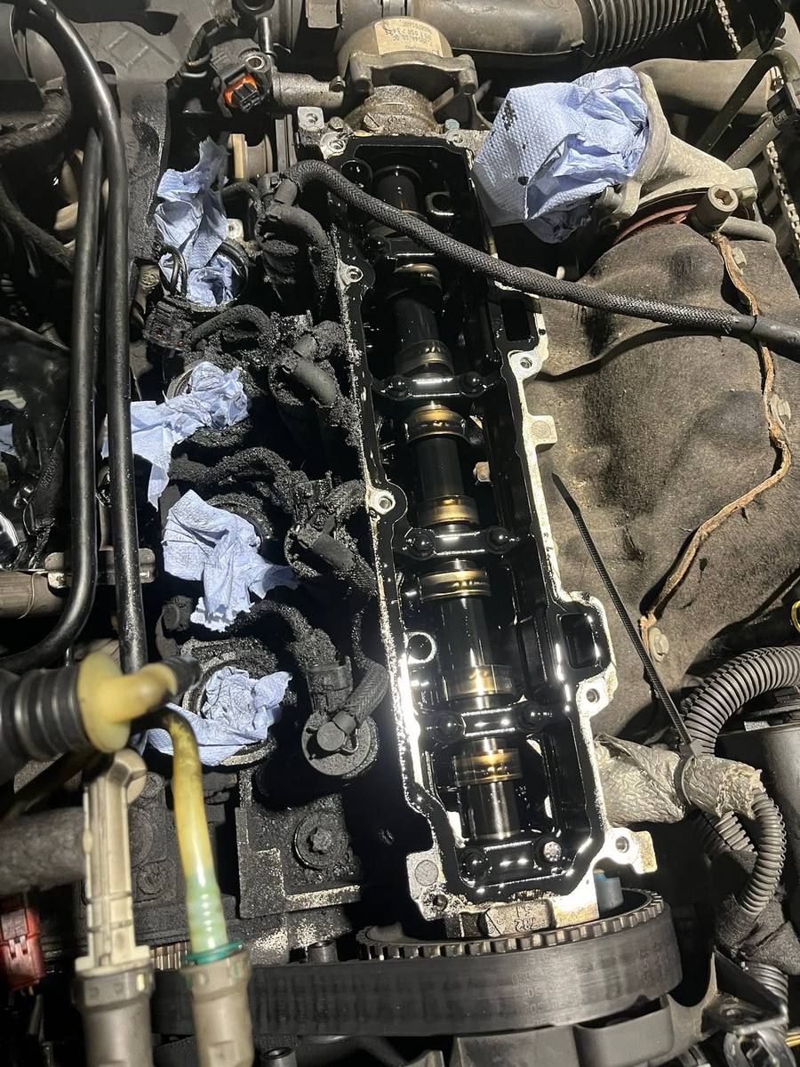 Cylinder head with rocker cover removed showing the camshaft